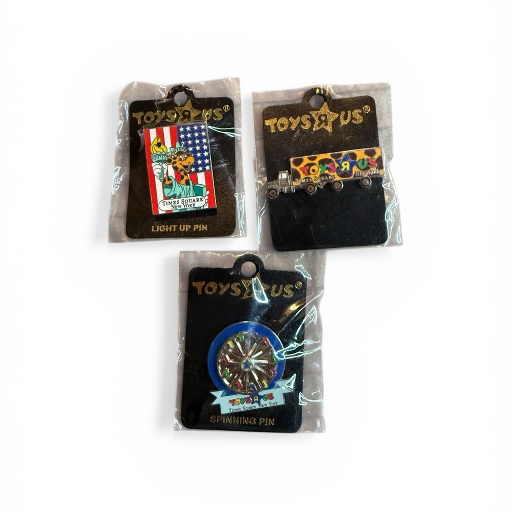 #59–VintageToys R Us collectors pins